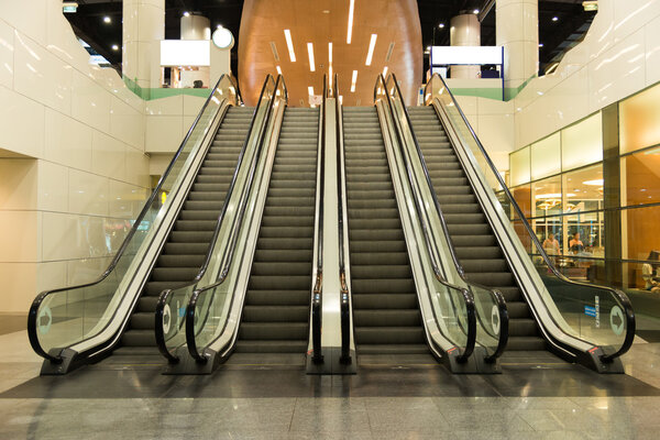Escalators move indoor public building