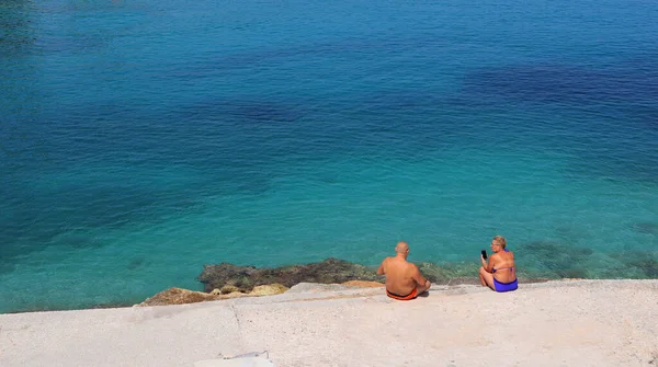 Old Couple Siting Beach Azure Water Ionian Sea Ksamil Albania Stock Image