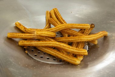 Churros - İspanya Santa Cruz de Tenerife 'de satılık İspanyol geleneksel tatlısı