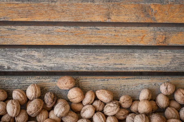 Walnuts and vintage wooden