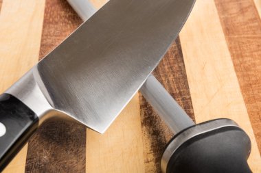 Sharpening knife closeup clipart