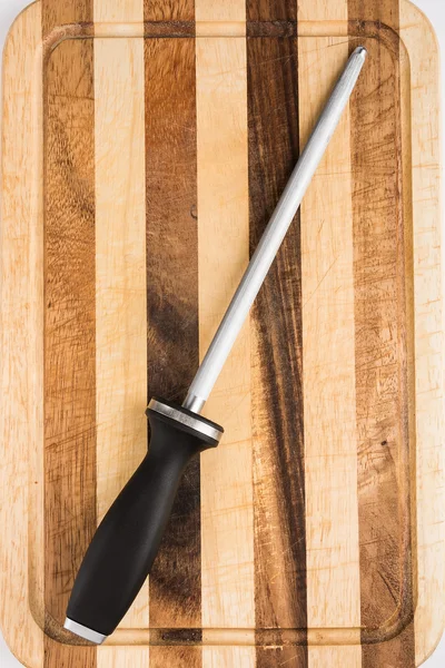 Honing steel on cutting board — Stock Photo, Image