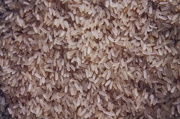 Фон зерна коричневого риса — стоковое фото