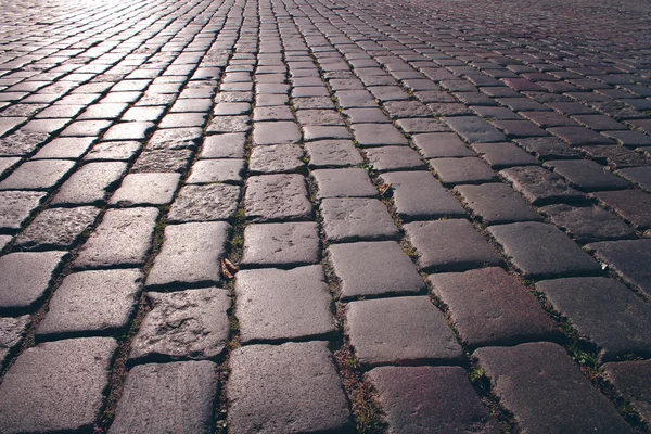 Background of cobblestones on the pavement in the old town — Stock Photo, Image