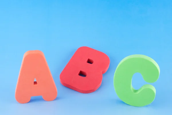 ABC on blue background Stock Photo