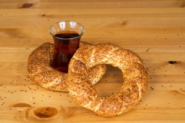 Turkish Bagel (Simit) on a wooden surface clipart