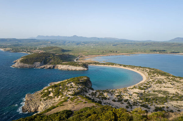 Voidokilia beach in Messinia (Peloponnese) in Europe, Greece, Peloponnese, Messinia, in summer on a sunny day.