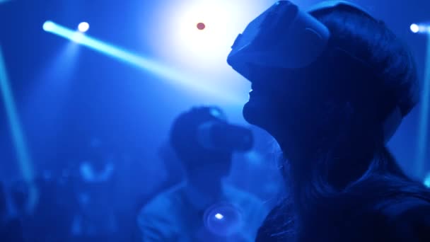 Young woman using Virtual Reality glasses at Alexandrian Theater show Saint-Petersburg 31.07.2015 — Αρχείο Βίντεο