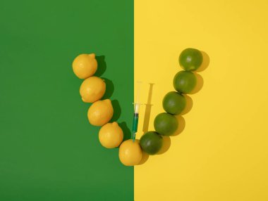 Limon ve kireç V harfi ile şekillendirilmiş. Aşıyı sembolize eden bir harf.