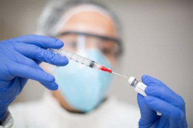 Cavid 19 'dan eldivenli ve koruyucu maskeli aşılar..