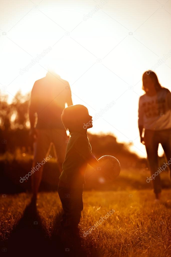 Happy family in park- family concept.
