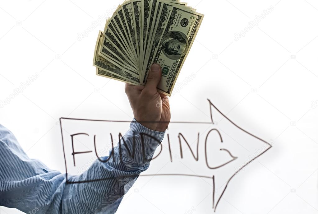 Business Man Displaying a Spread of Cash isolated on white background.