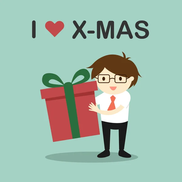 经营理念，商人拿着一个礼品盒，上面写着"我爱X-mas"。矢量插图. — 图库矢量图片