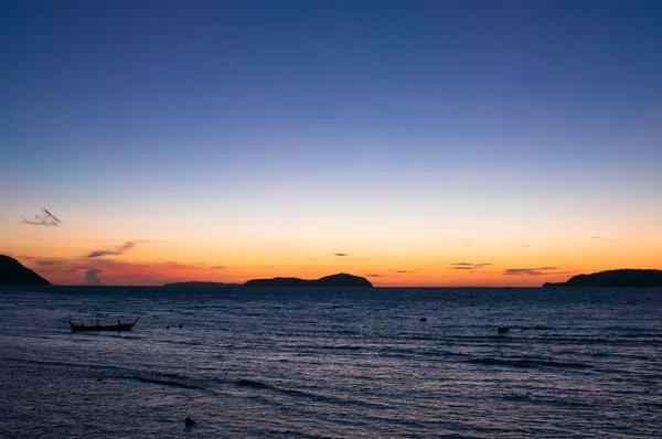 Sunrise in Rawai with long tail boat — Stock Photo, Image