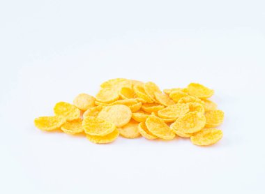 Yulaf ezmesinden, mısır gevreğinden ya da müsli işleminden, beyaz arka planda sağlıklı kahvaltıya kadar izole edilmiş bir görüntü..