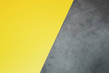 Sarı-gri arka plan. Tasarım için minimalist geometrik konsept. 2021 trendinin rengi aydınlatıcı ve nihai gri.