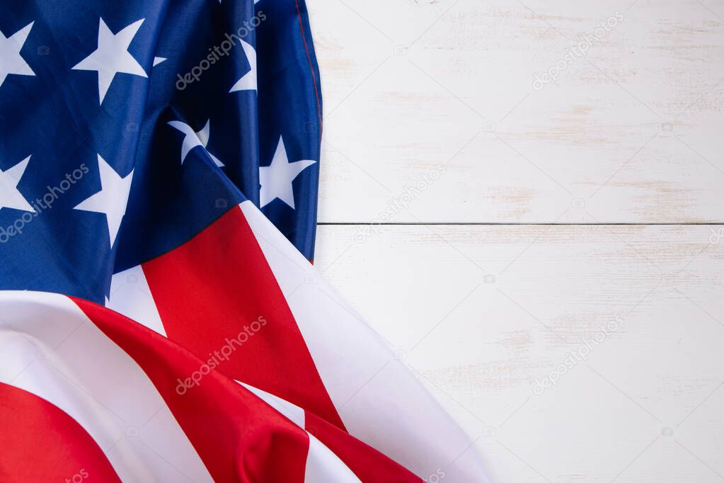 American flag on light boards. Culture of the USA. Background for Independence Day, Memorial Day or Labor Day. Place for your text.