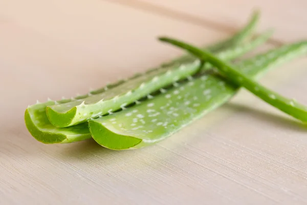 Aloe vera isolated on wooden board background — Stock Photo, Image