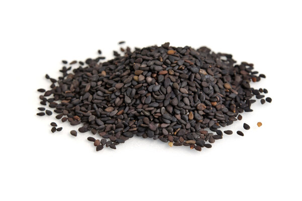 Pile of black sesame seeds isolated on white background
