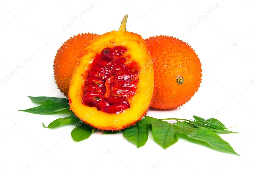 Gac fruit, typical of orange-colored plant foods in Asia with ha