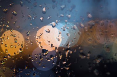 Yağmur suyu damlacık bulanık bokeh arka plan penceresindeki