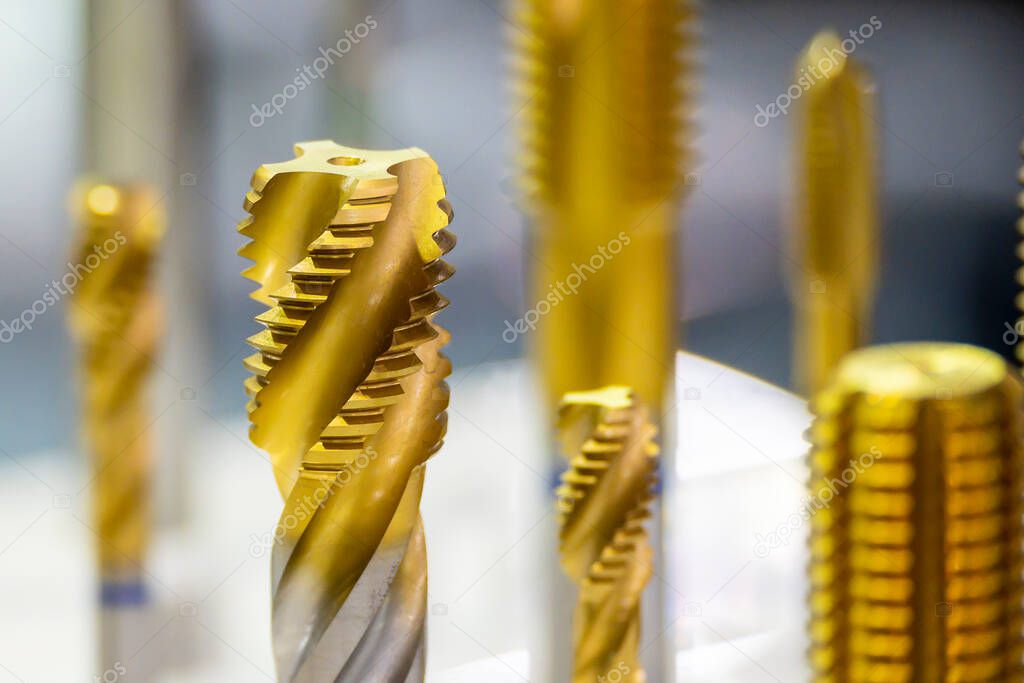 Close up scene of machine tapping tool for CNC machine. The threading tool for hard material on CNC machining center.