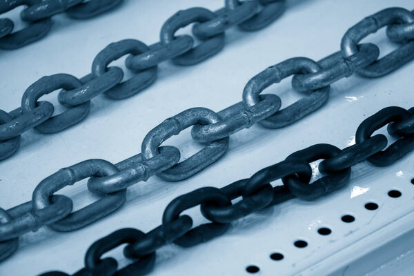 Линия стальных цепей запасных частей. Запасные части промышленной части.