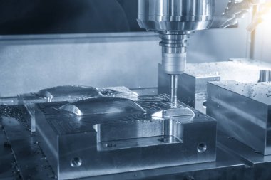 CNC değirmen makinesi, dizinlenebilir son değirmen araçlarıyla enjeksiyon küf parçalarını kesiyor. Kalıplar ve ölüm üretim süreci, son değirmen araçları ile makine merkezi tarafından.