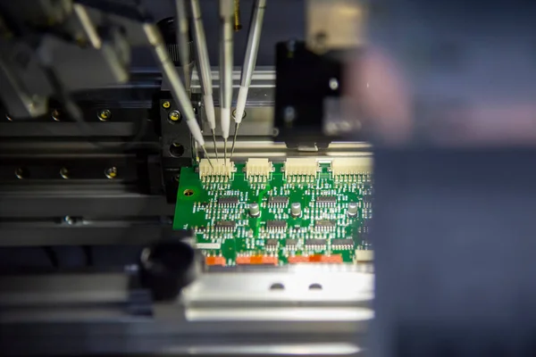 The automatic system assembly line for electronics circuit board. The hi-technology manufacturing process by assembly robotic system.