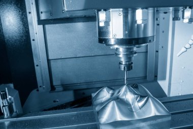 CNC değirmen makinesi, küf parçalarını sert top değirmeni tipine göre kesiyor. Yüksek hassasiyetli kalıp ve makine merkezi tarafından üretilen konsept.. 