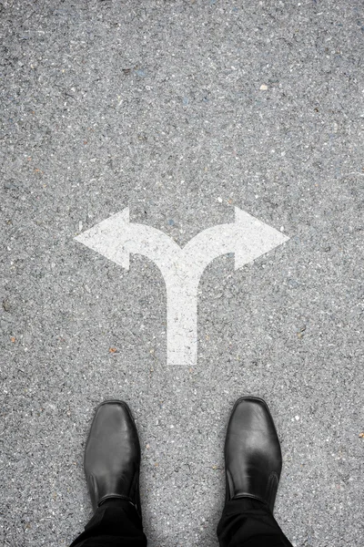 Black shoes standing at the crossroad — Stock Photo, Image