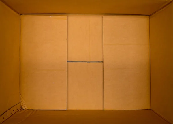 Картонная коробка в качестве фона — стоковое фото