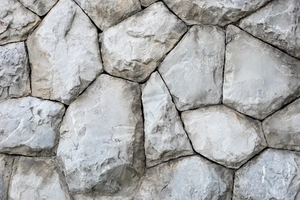 Pared de piedra en detalle como fondo — Foto de Stock