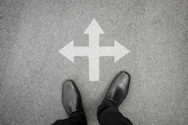 Black shoes standing at the crossroad — Stock Photo, Image