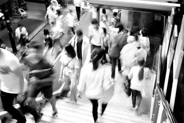 Moving blur people walking - black and white effect — Stock Photo, Image