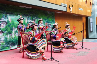 Tibetan group performing music clipart