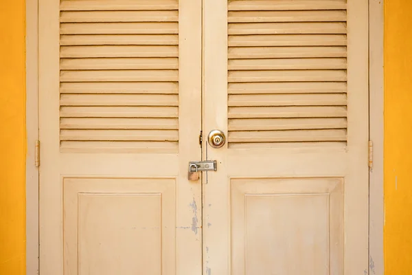 Locked door in classic building Stock Image