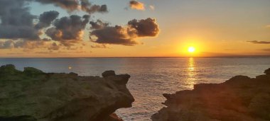 Stunning aurora sunset at Devil's Tears Nusa Lembongan