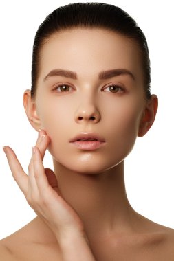 Make-up & cosmetics. Closeup portrait of beautiful woman model face with clean skin on white background. Natural skincare beauty, clean soft skin. Spa treatment