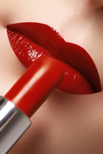 Close-up of woman's lips with fashion red make-up. Beautiful female mouth, full lips with perfect makeup. Part of female face. Macro shot of beautiful make up on full lips — Stock Photo, Image