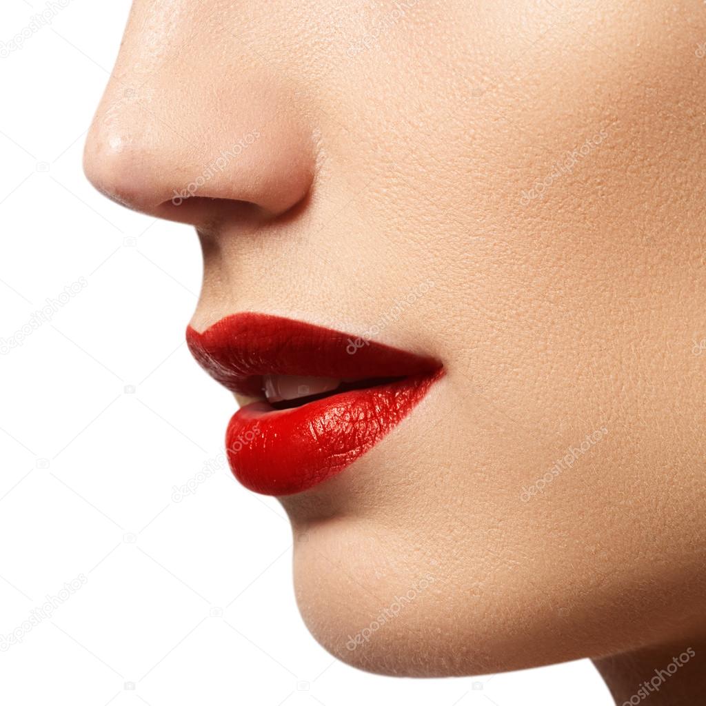 Part of the woman face with cassic red lips