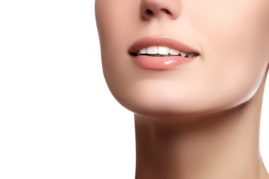 Close up  beauty  portrait view of a young woman natural smile with voluptuous pink lips  smiling with white teeth, classic beauty detail. Beautiful wide smile of young fresh woman with great healthy white teeth. Isolated over white background