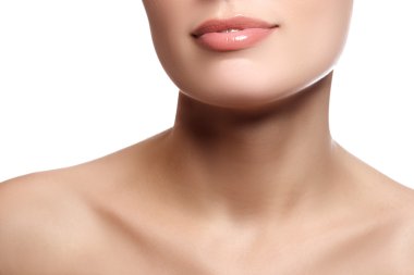 Close-up happy female smile with healthy white teeth. Cosmetology, dentistry and beauty care. Macro of woman's smiling mouth. Smile of young fresh woman with great healthy white teeth. Isolated over white background