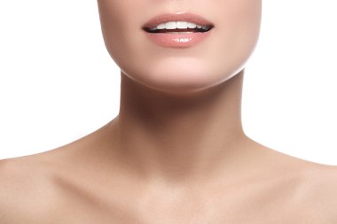 Close-up happy female smile with healthy white teeth. Cosmetology, dentistry and beauty care. Macro of woman's smiling mouth. Smile of young fresh woman with great healthy white teeth. Isolated over white background