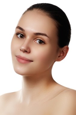 Make-up & cosmetics. Closeup portrait of beautiful woman model face with clean skin on white background. Natural skincare beauty, clean soft skin. Spa treatment