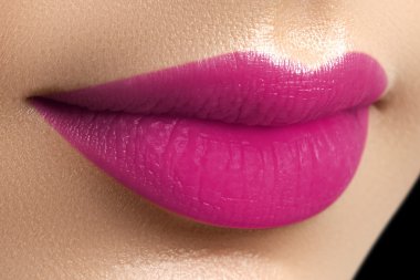 Perfect fuchsia lips. Sexy girl mouth close up. Beauty young woman smile. Fuchsia plump full Lips. Lips augmentation. Close up detail. Bright full lips