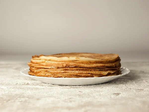 Russian taste pancakes on wooden table — Stock Photo, Image