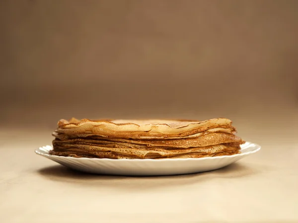 Russian taste pancakes on wooden table — Stock Photo, Image