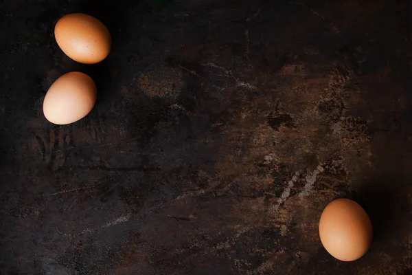 Eggs on dark background. — Stock Photo, Image