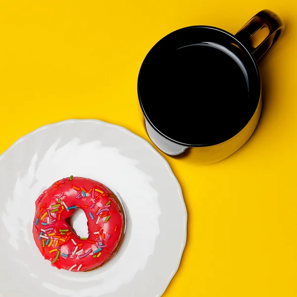 Bright donut on white plate — Stock Photo, Image